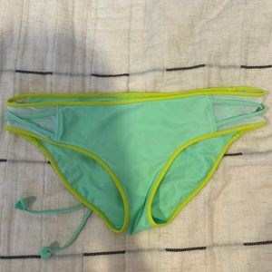 lululemon swim suit. size 2. worn. like green and yellow. adjustable.
